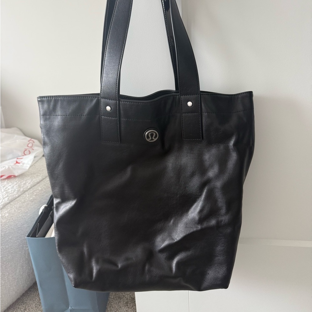 Lululemon Athletica Black Tote with Sleek Design